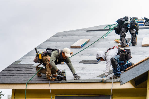 Professional Emergency Roof Repair technician working in Johnstown, NY